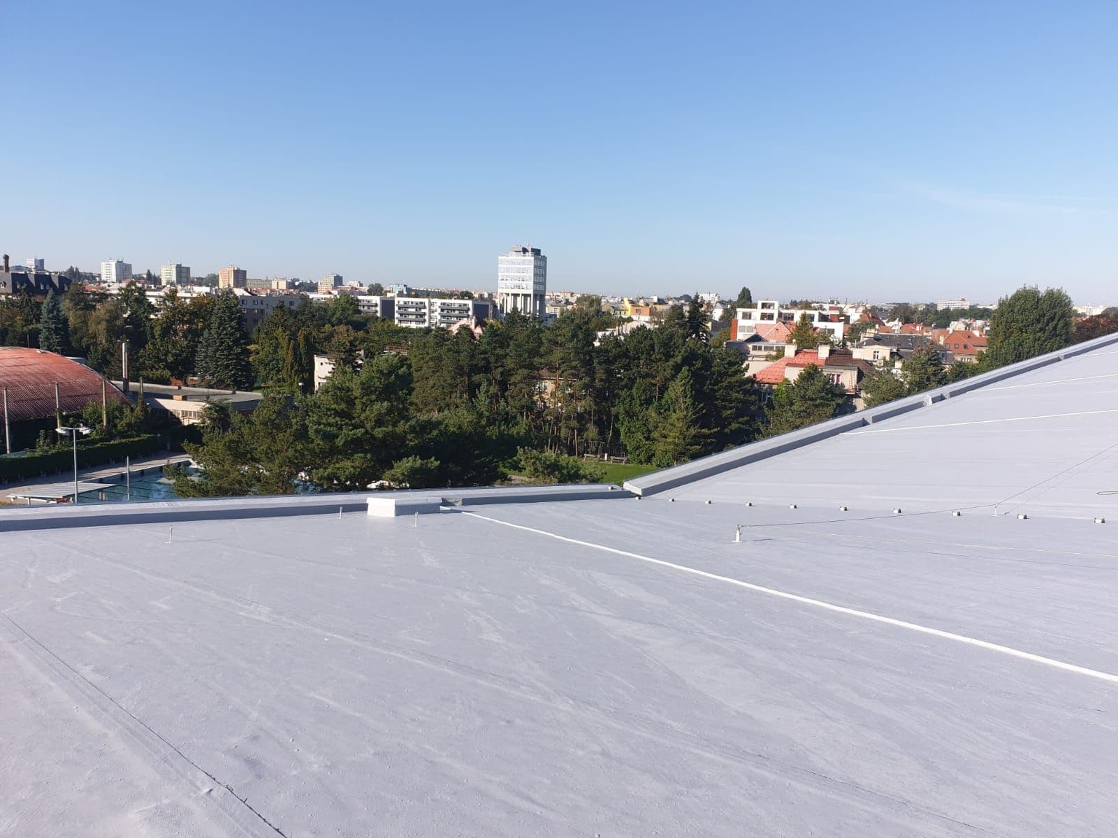Realizovaná střecha — Plavecký bazén Olomouc, Olomouc